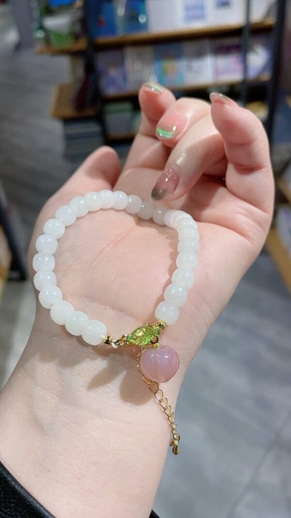 허톈옥 원석 팔찌 · 규격 6×7mm